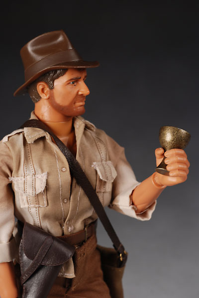 Indiana Jones action figure and Monopoly Holy Grail